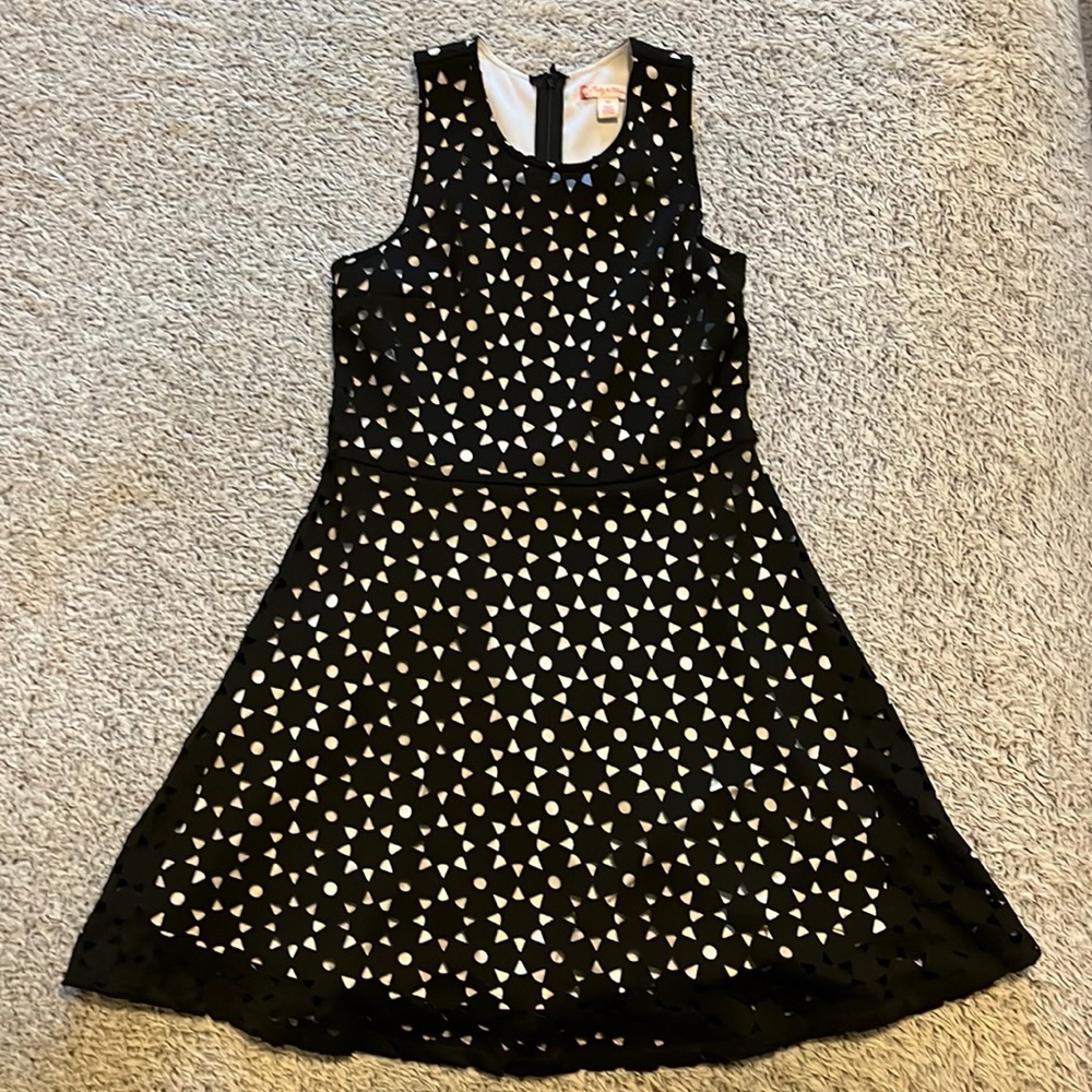 A black and white cut-out dress. A girls size 12 made by Ruby and Bloom.
